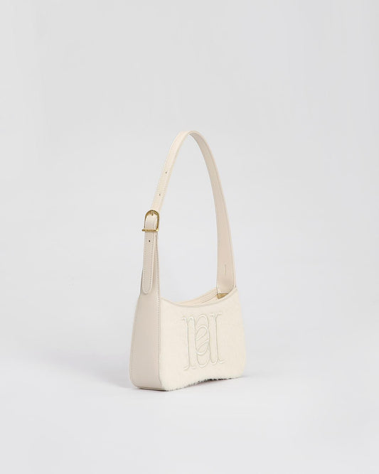 Camile Schoudertas in Alpaca wol en leder