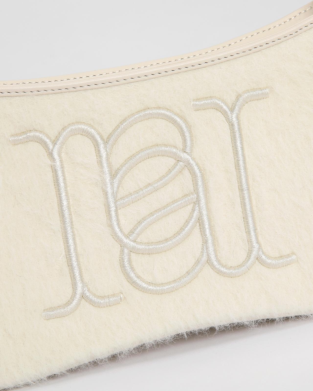 Camile Schoudertas in Alpaca wol en leder