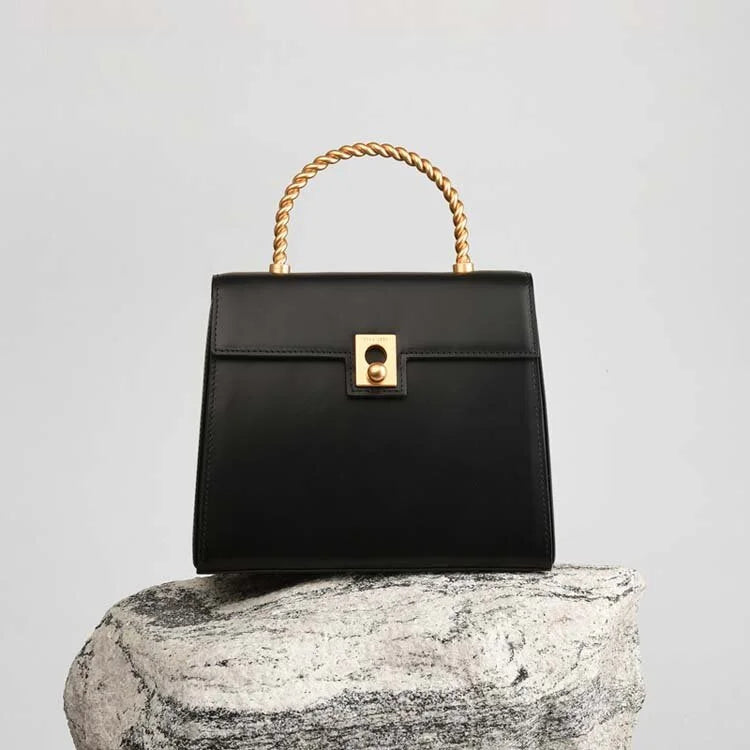 1960 Twist Knot Handle Bag – Tijdloze elegantie met een vintage toets