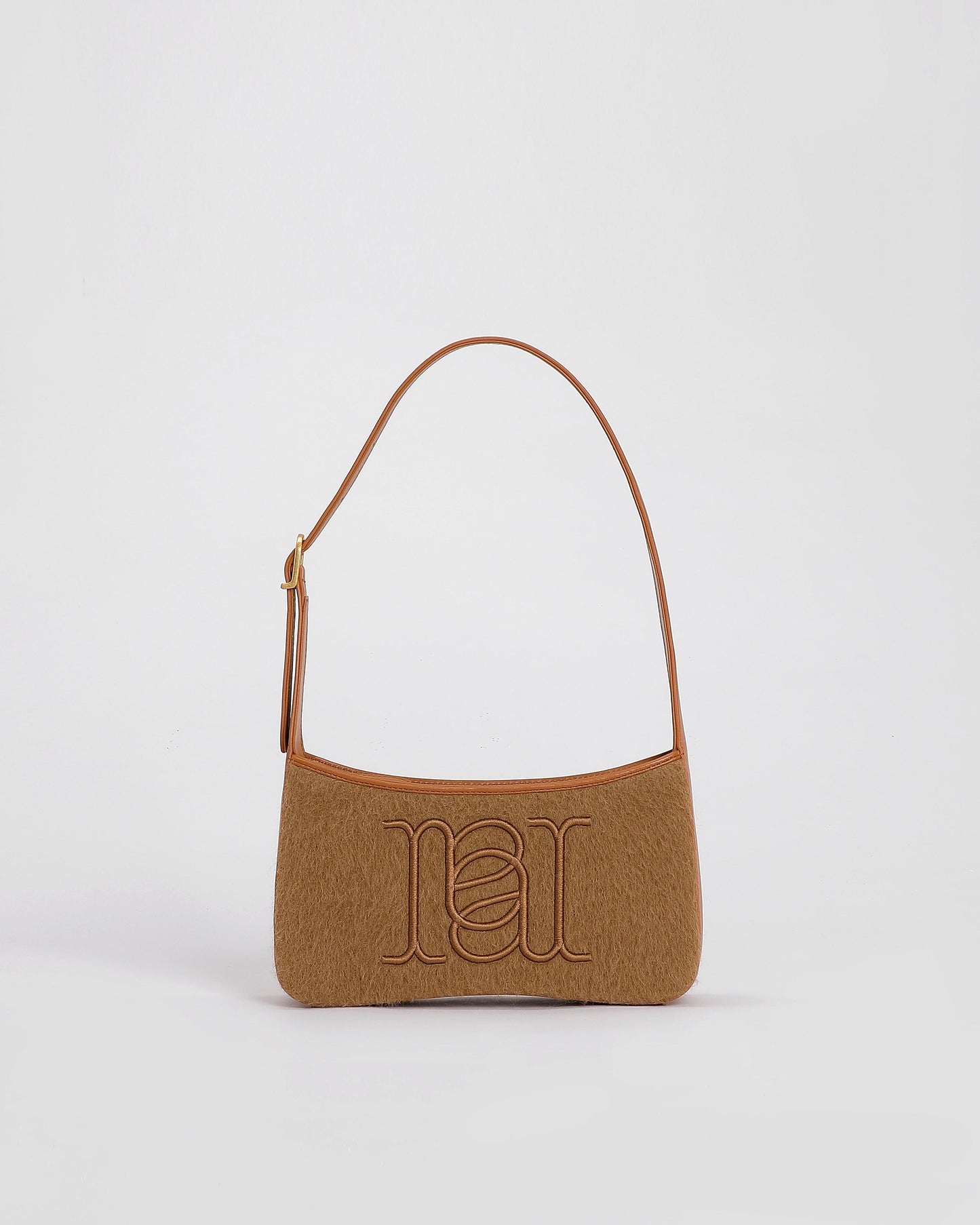 Camile Schoudertas in Alpaca wol en leder