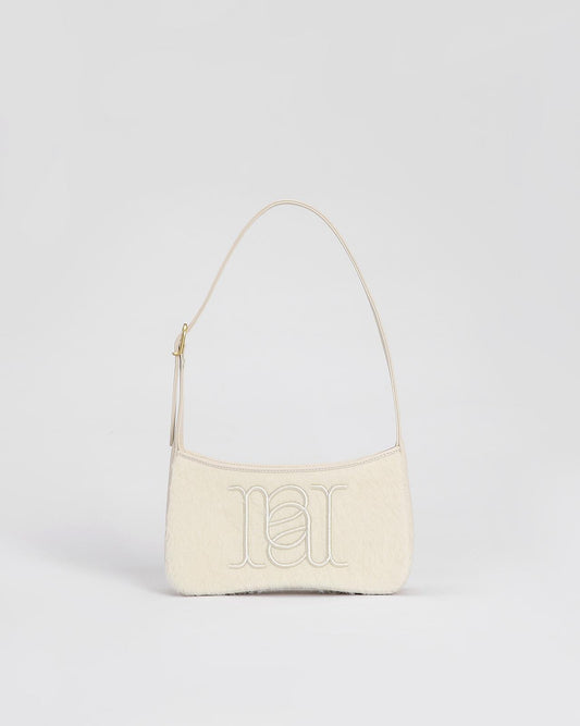 Camile Schoudertas in Alpaca wol en leder