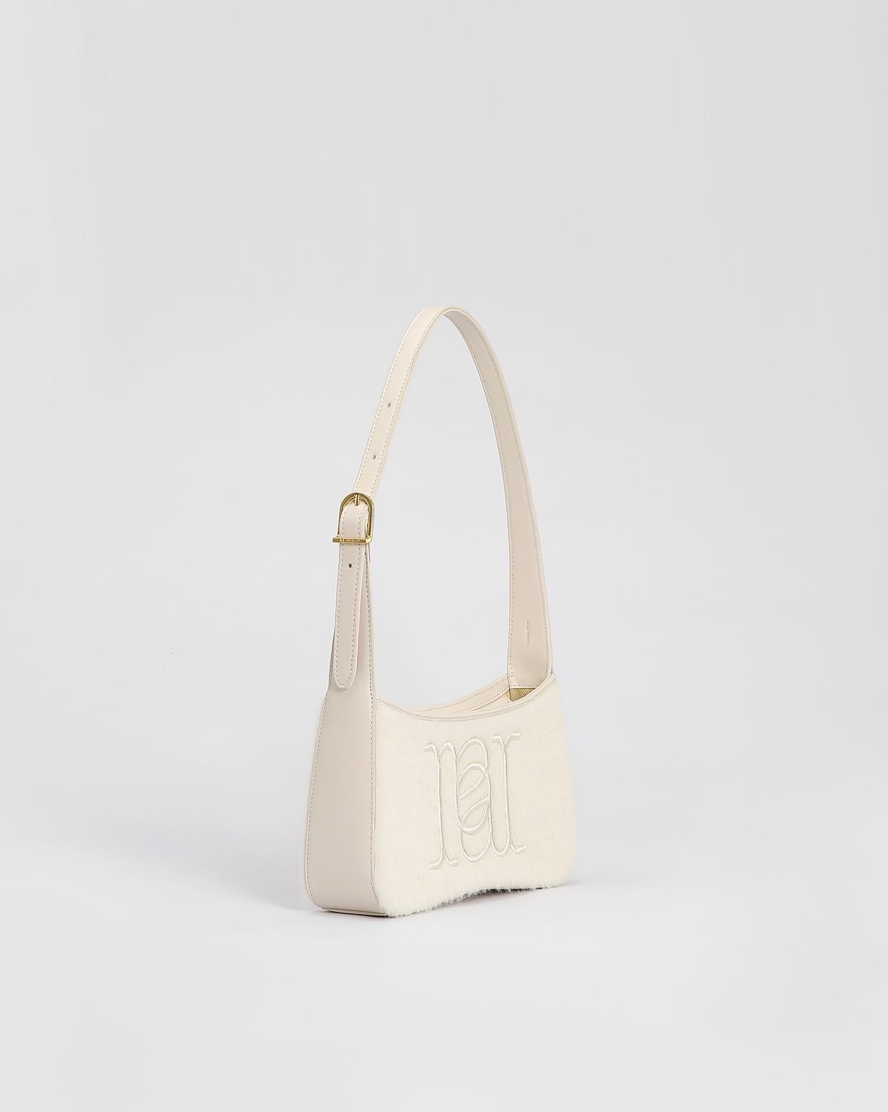 Camile Schoudertas in Alpaca wol en leder